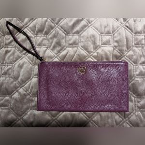 EUC MICHAEL by Michael Kors jet set charm merlot leather wristlet  (257)